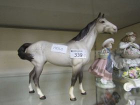 A Beswick ceramic figure of a dappled grey horse