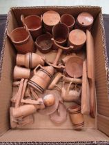 A box containing a quantity of wooden barrels, animals, etc