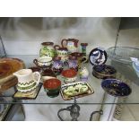 An assortment of ceramic tableware to include oriental style blue ground pin dishes, Devon ware