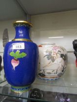 A large 20th century oriental style ginger jar (Minus lid) along with a blue ground cloisonné case