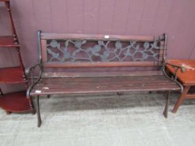 A wood and metalwork garden bench (A/F)