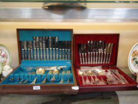 Two part canteens containing a large assortment of King's pattern flatware