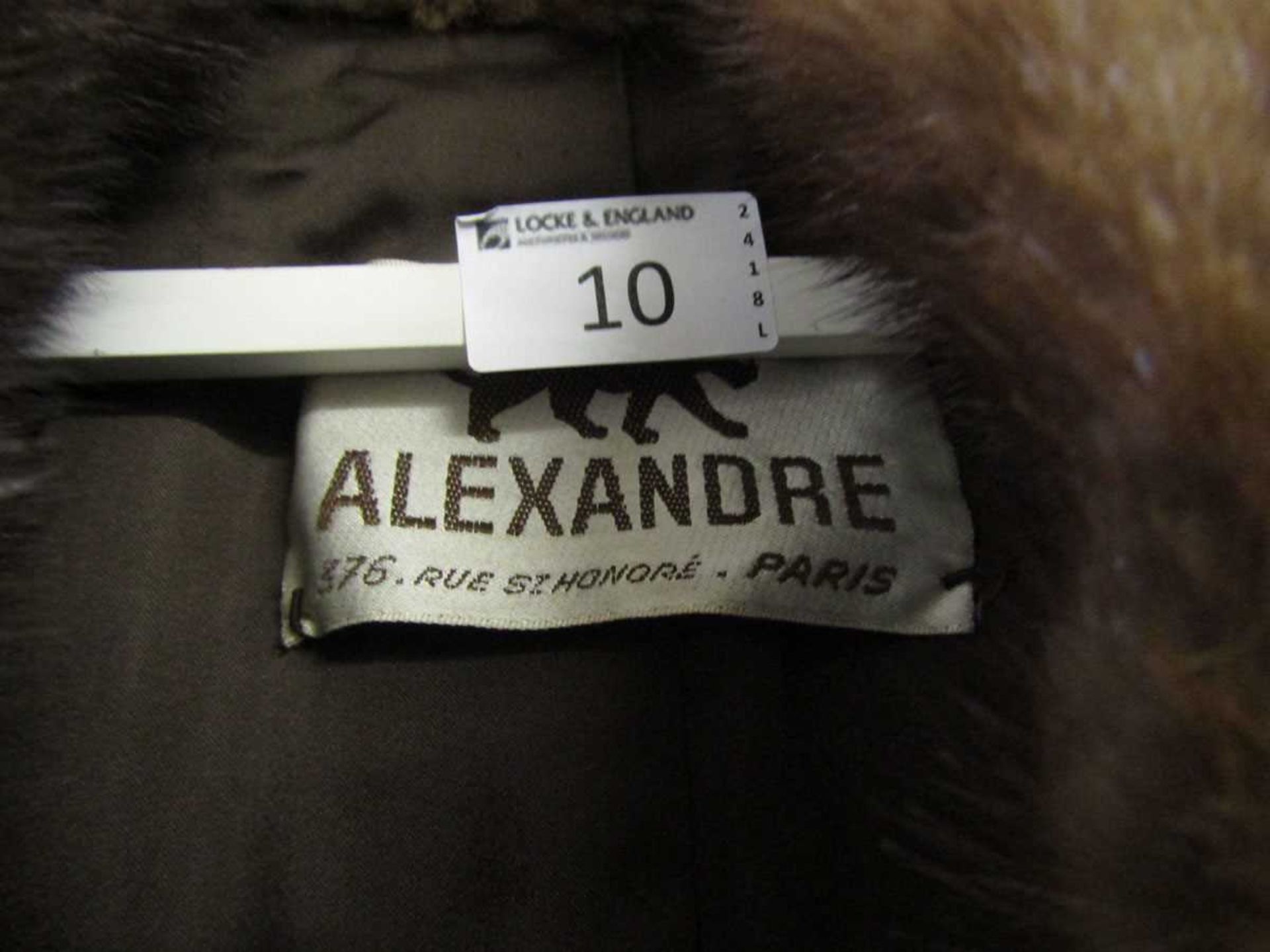 A brown fur coat by Claude Alexandre of Paris along with a Christian Dior furrier's bag - Image 2 of 3