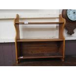 A mid-20th century oak wall mounted bookcase