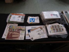 A quantity of stamps, first day covers, etc