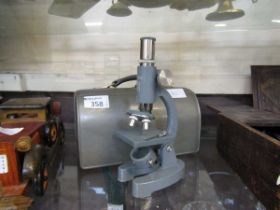 A cased Skybolt monocular microscope