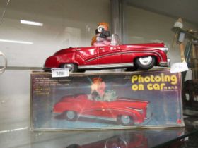 A boxed battery operated 'Photoing On Car'