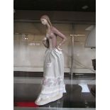 A large Lladro figurine of elegant lady (A/F)