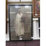 An early 20th century framed and glazed photograph of bride