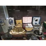 A large assortment of items to include gilt metal purse, silver hallmarked dressing table mirror,