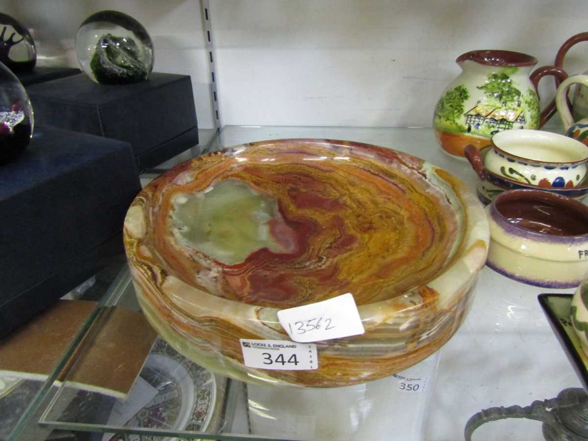 A mid-20th century style multi coloured onyx bowl