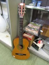 An Encore acoustic guitar, model no. ENC36N