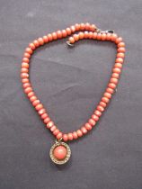 A coral beaded necklace