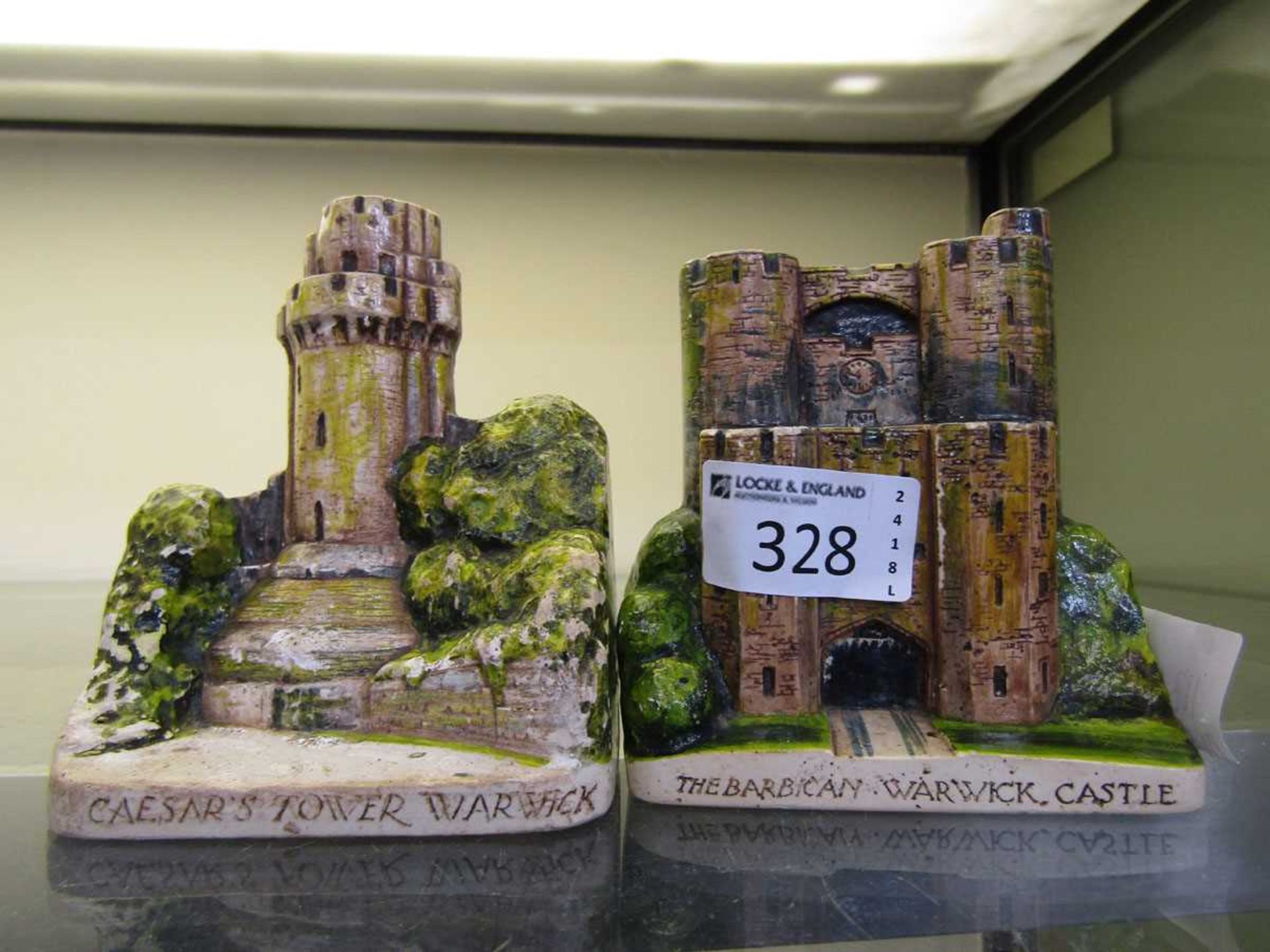 Two plaster moulded models of 'Caesar's Tower' and 'The Barbican' of Warwick, signed A.Coftman