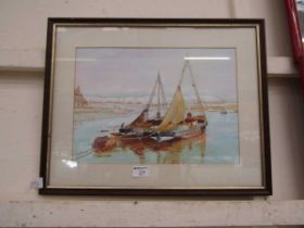 A framed and glazed watercolour of fishing boats