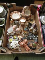 A tray of decorative ceramic cups, saucers, ceramic figures of birds, etc