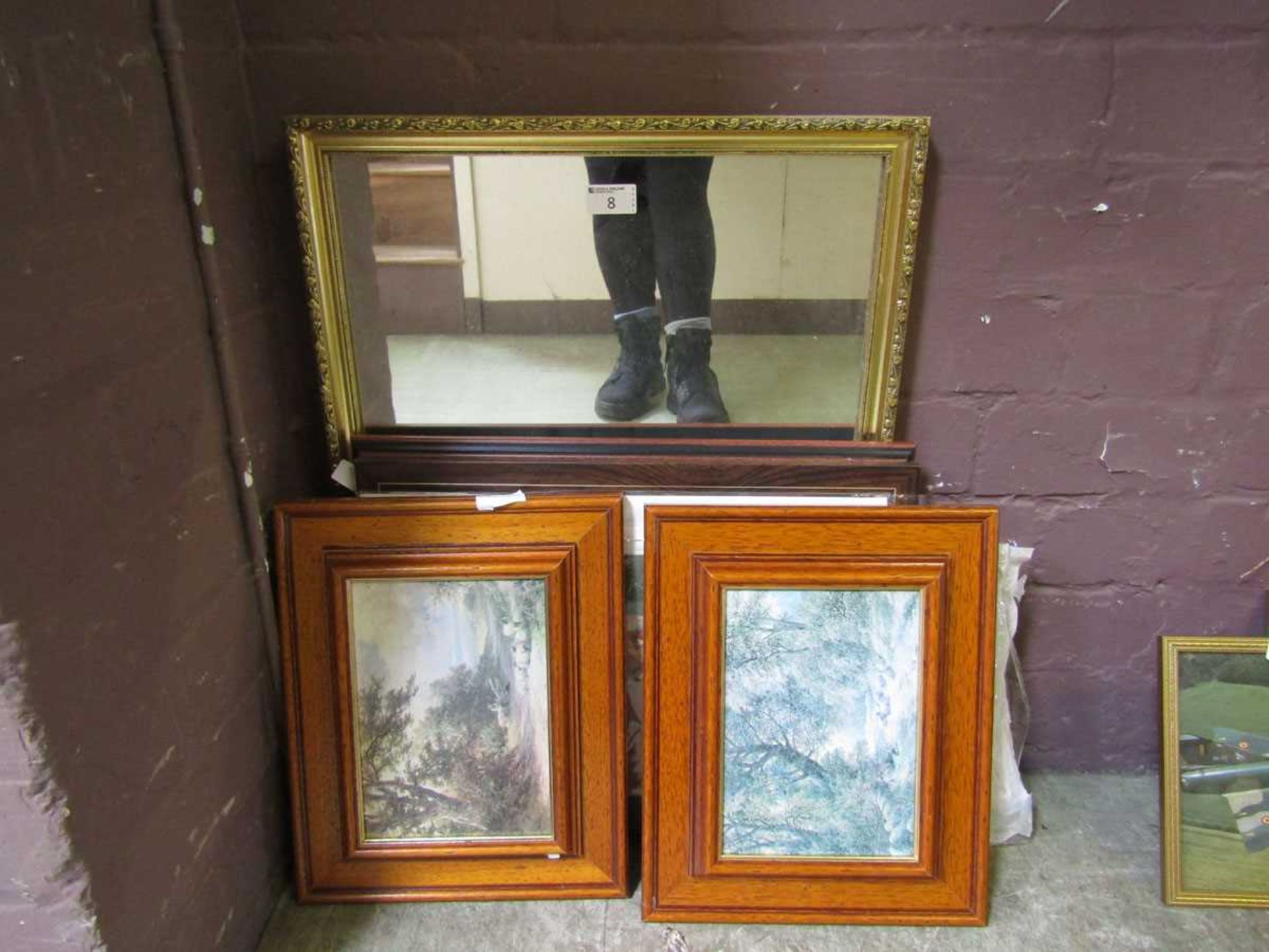 A gilt framed wall mirror together with a selection of framed and mounted prints to include Martin