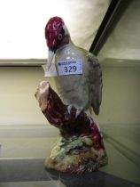 A Beswick ceramic figurine of a woodpecker model no.1218