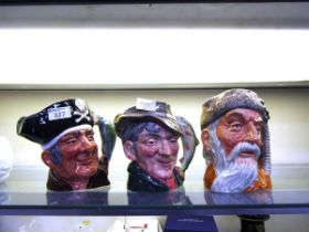 Three Royal Doulton ceramic character jugs 'Long John Silver' D6335, 'The Poacher' D6429, and '