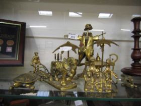 An assortment of nine items of brassware to include brass model of a scarecrow, 'See No Evil, Hear