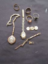 A quantity of 9ct gold marked rings and watches, approx. weight 20-25g Lengths of broken watch