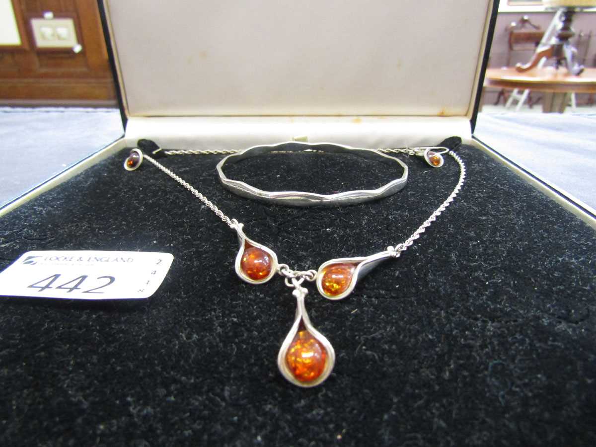 A silver hallmarked bangle together with a modern orange stoned necklace and matching earrings - Image 2 of 2