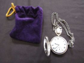 A silver hallmarked cased half hunter pocket watch with silver hallmarked albert chain and fob