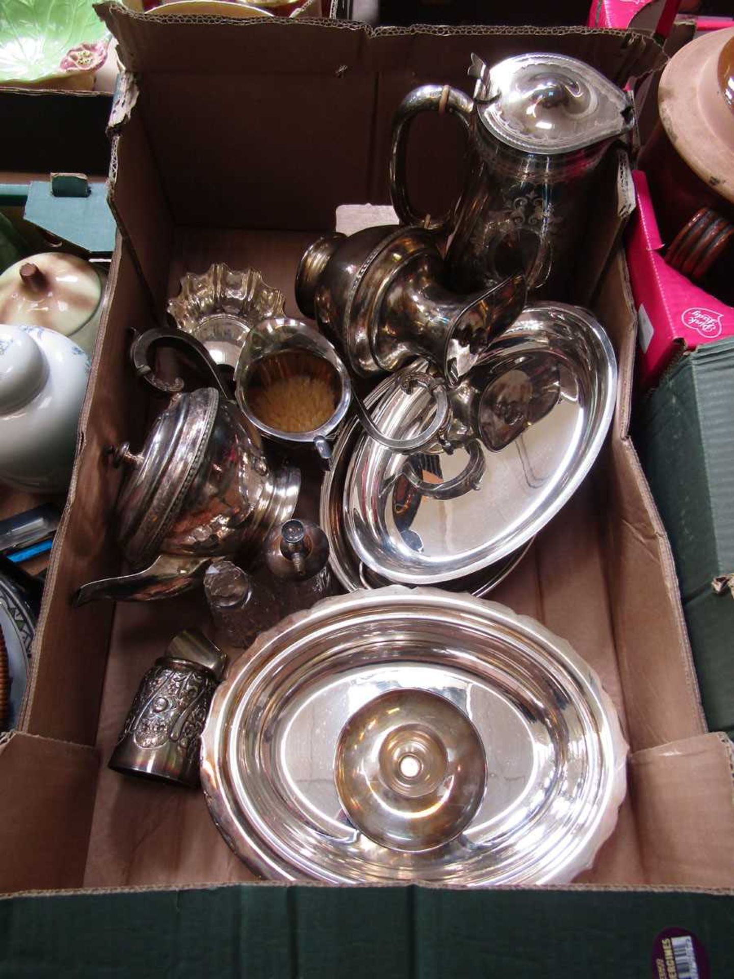 A tray of plated ware to include coffee pots, teapots, mugs, etc