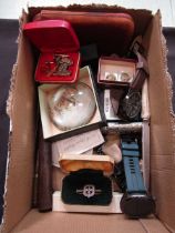 A box containing cuff links, watches, coinage, etc