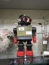 A mid-20th century style toy robot