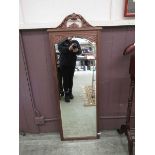 A painted bevel glass wall mirror