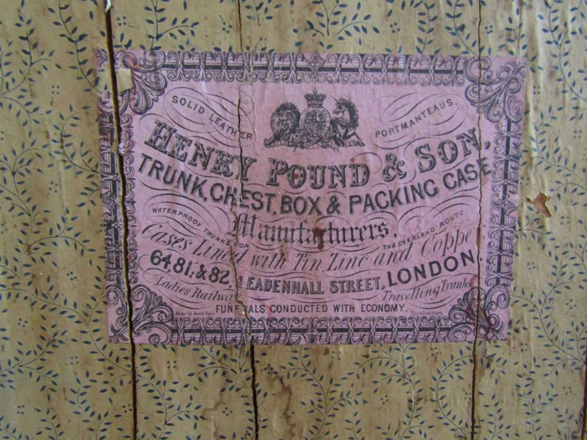A 19th century oil skin and metalwork travelling trunk by retailer Henry Pound and Sons - Image 2 of 3