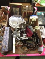 A tray containing horse brasses, old maps, Cash's silks, flatware, etc