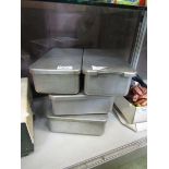 Four industrial stainless steel catering tins