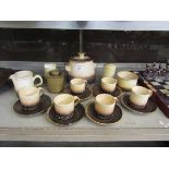 A selection of Iden Pottery tableware to include cups, saucers, tureen, etc