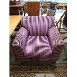 A modern purple striped upholstered easy chair