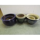 Three graduating pairs of glazed garden pots