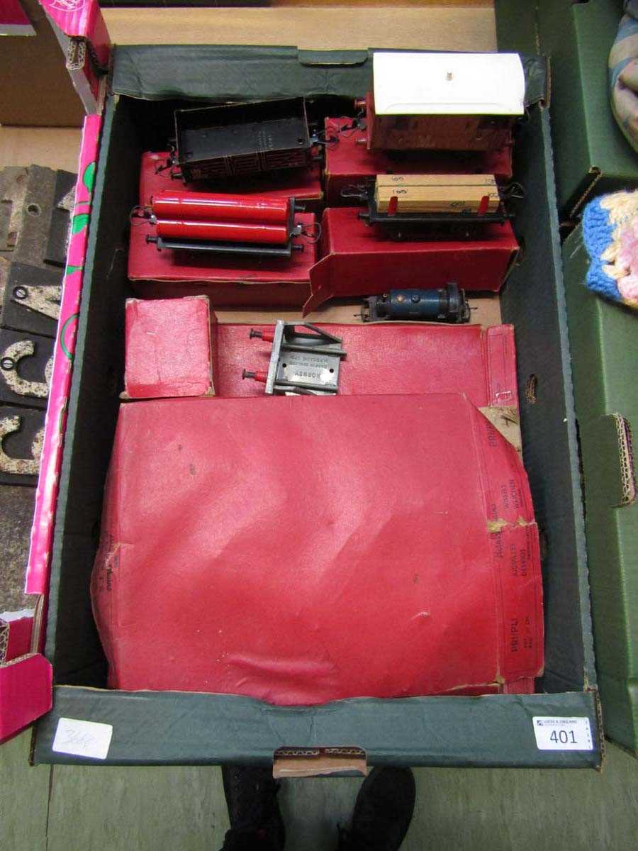 A tray containing an assortment of boxed Hornby items to include engine, carriages, track, etc