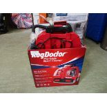 +VAT A boxed Rug Doctor portable spot cleaner