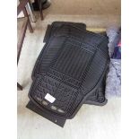 +VAT An assortment of Michelin rubber car mats