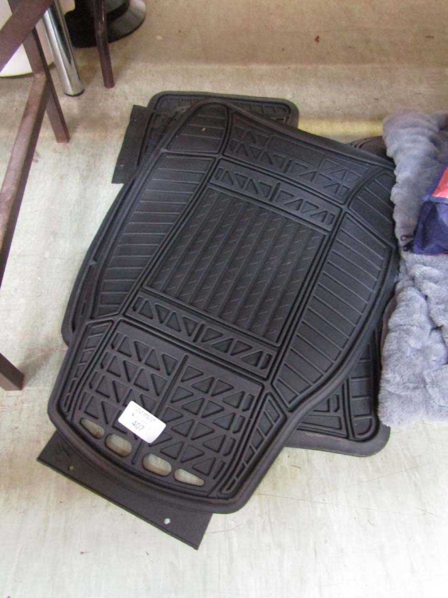 +VAT An assortment of Michelin rubber car mats