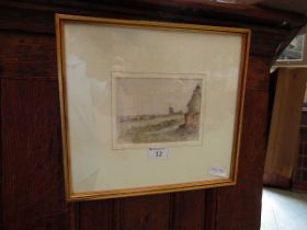 A framed and glazed watercolour of coastal windmill scene signed to bottom right