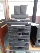 A Kenwood stacking Hi-Fi system comprising of turntable, stereo double auto reverse cassette deck,