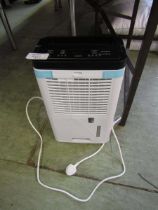 +VAT An unboxed Woods dehumidifier