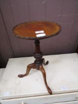 A small reproduction mahogany wine table