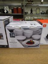 +VAT A boxed twenty-four piece, six place set of Mikasa 'Swirl' ceramic tableware