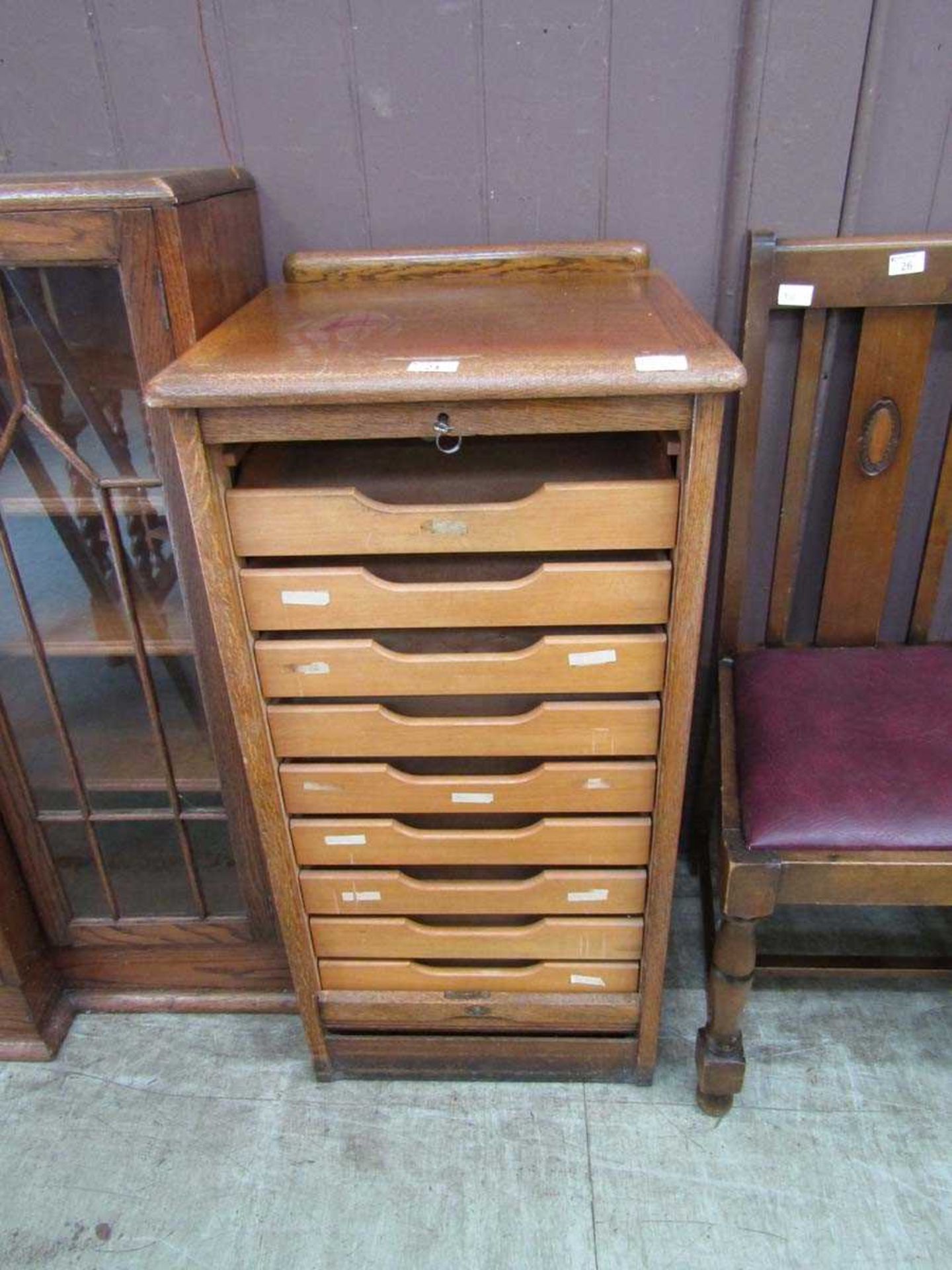 An early 20th century oak tambour fronted stationery cabinet having nine drawers - Image 2 of 2
