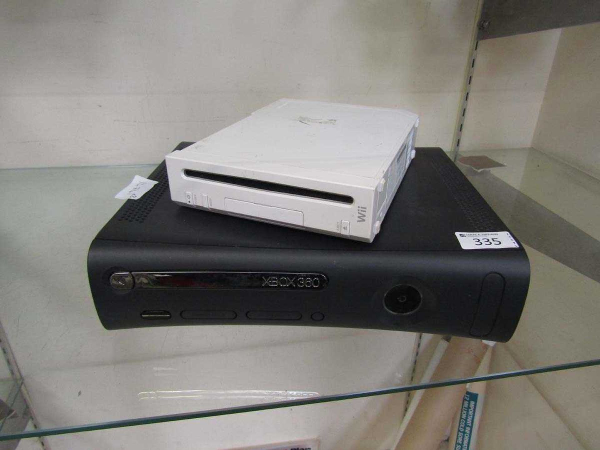 An Xbox 360 and a Nintendo Wii (No PSU)