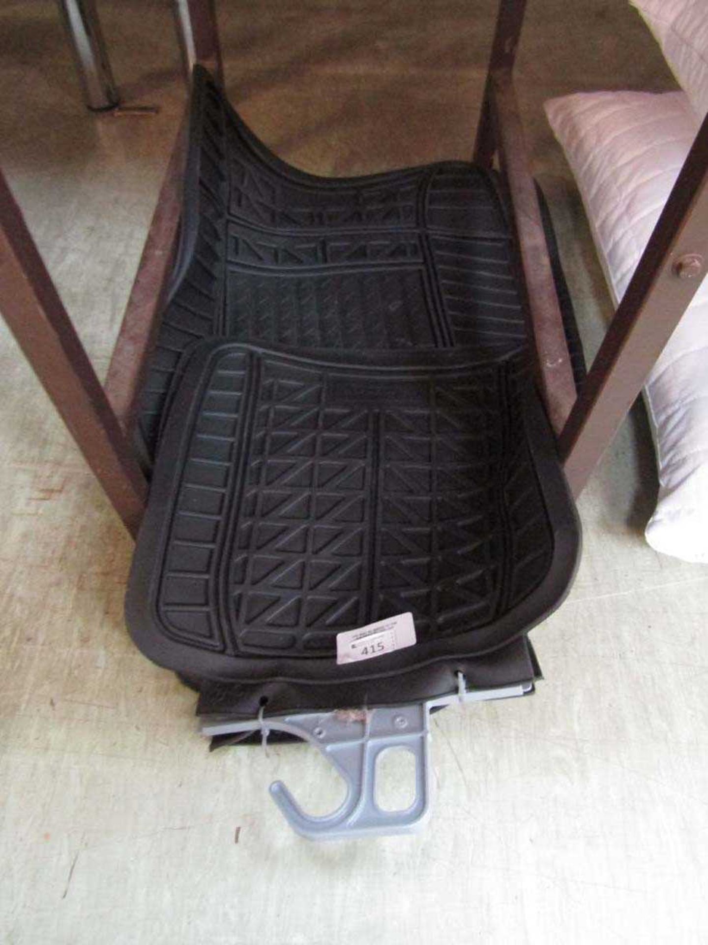 +VAT An assortment of Michelin rubber car mats