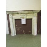 A marble effect fire surround (A/F) We believe the fire surround is most likely made of plaster.